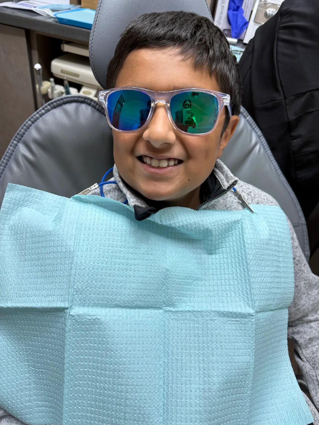 Young patient smiling in the treatment chair at Crystal Clear Orthodontics & Pediatric Dentistry